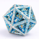 Skull's Grin Hollow Metal Dice Set - Glow in the Dark Blue - Bards & Cards