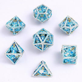 Skull's Grin Hollow Metal Dice Set - Glow in the Dark Blue - Bards & Cards
